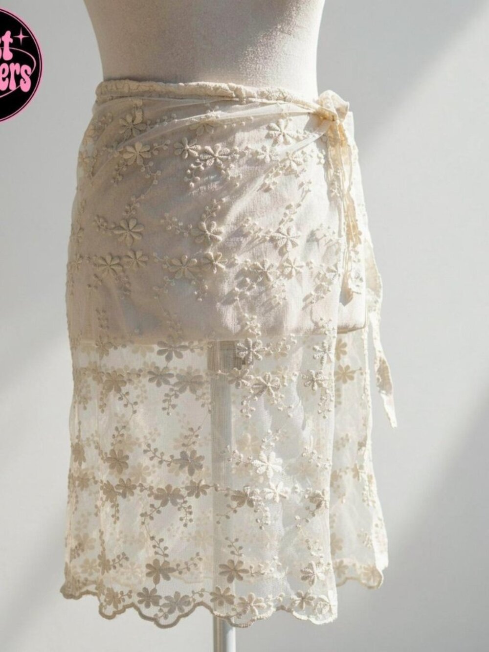Y2k 2000s style white lace wrap skirt with floral embroidery and tie waist